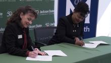 JSCC President Allana Hamilton and UofM Provost Karen Weddle-West sign MOU JSCC President Allana Hamilton and UofM Provost Karen Weddle-West sign MOU