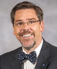 Dr. Tristan Denley Dr. Tristan Denley headshot